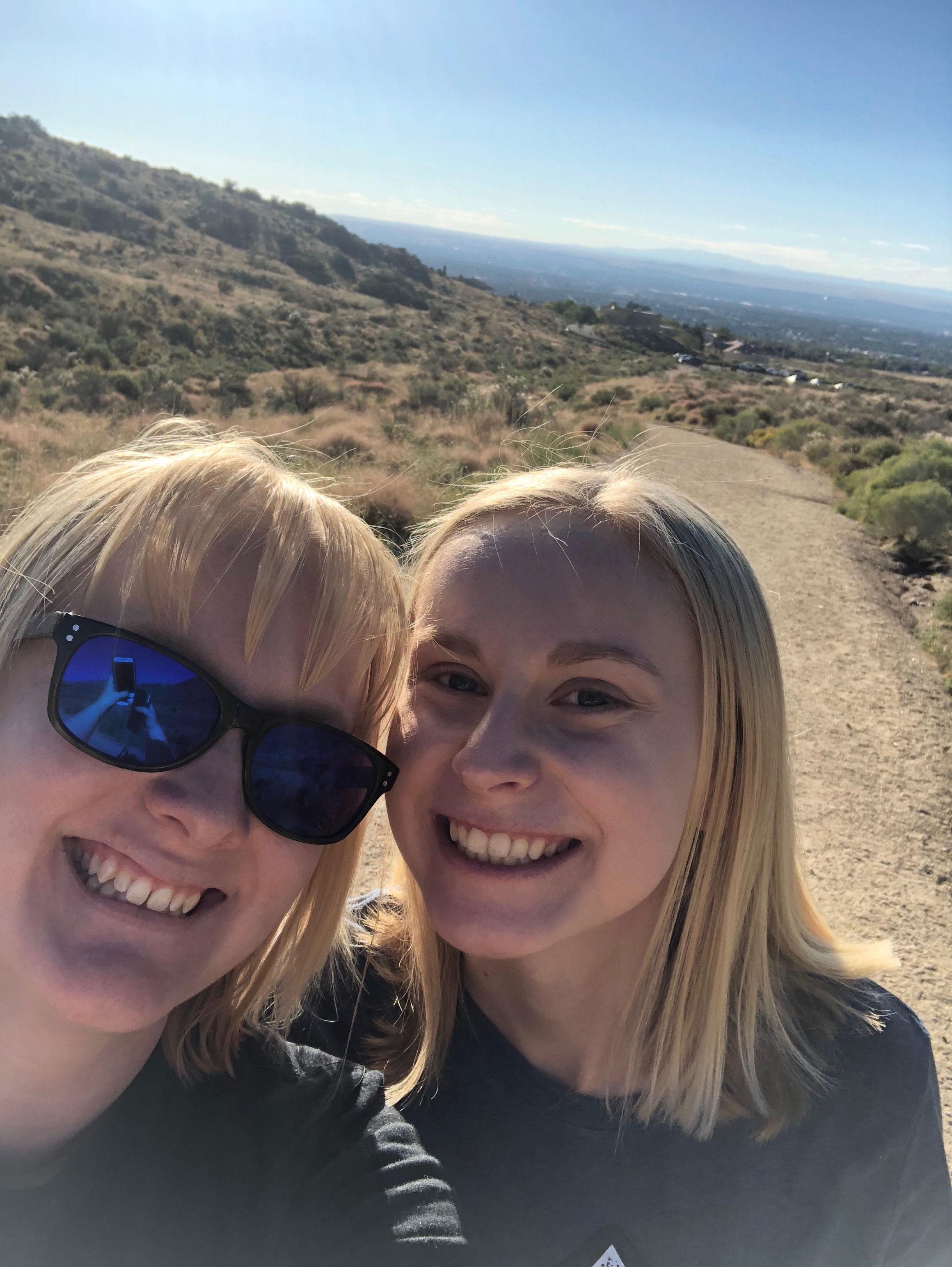Autumn on a hike with her sister.