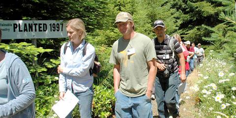 Teachers walking on a trail. 