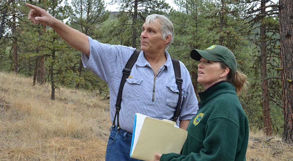 Oregon Department of Forestry consulting with a landowner