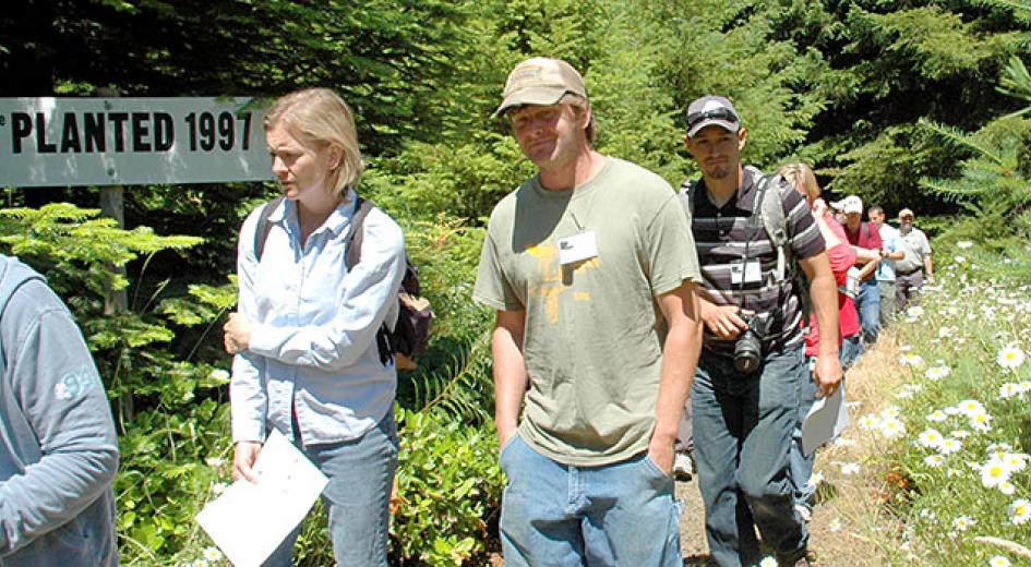 Teachers walking on a trail. 