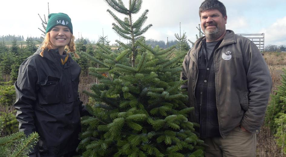 Brooklynn and Greg Smith on their Christmas tree farm. 